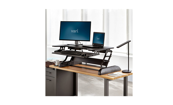 Varidesk Cube Plus 40 with monitor and laptop in a standing position