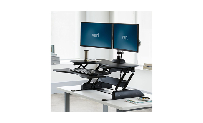Varidesk Pro Plus 36 in the standing position on a desk